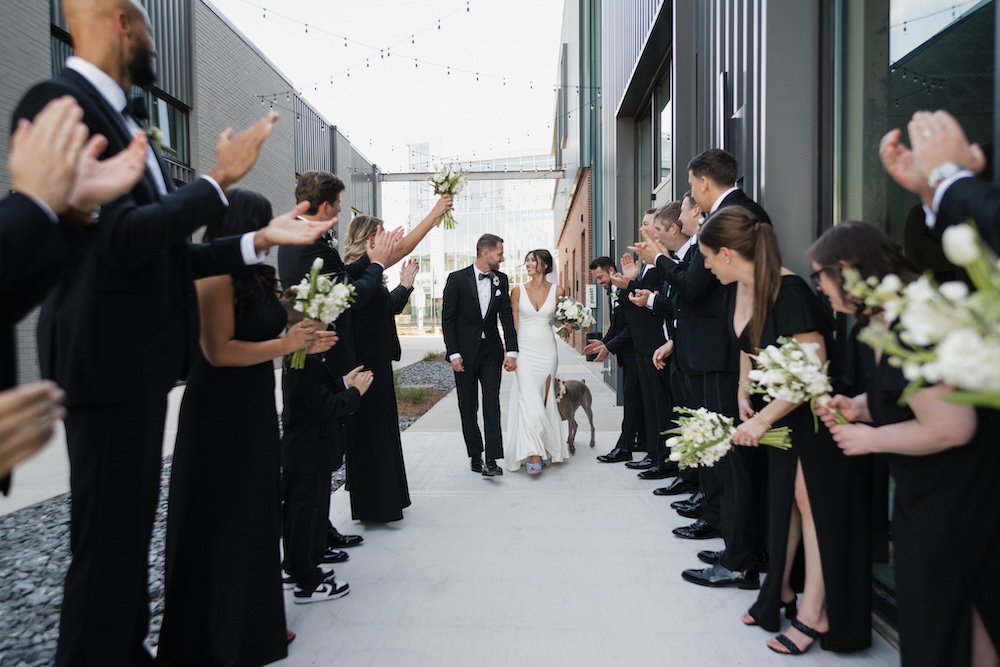 Wedding party photos outside of PINE