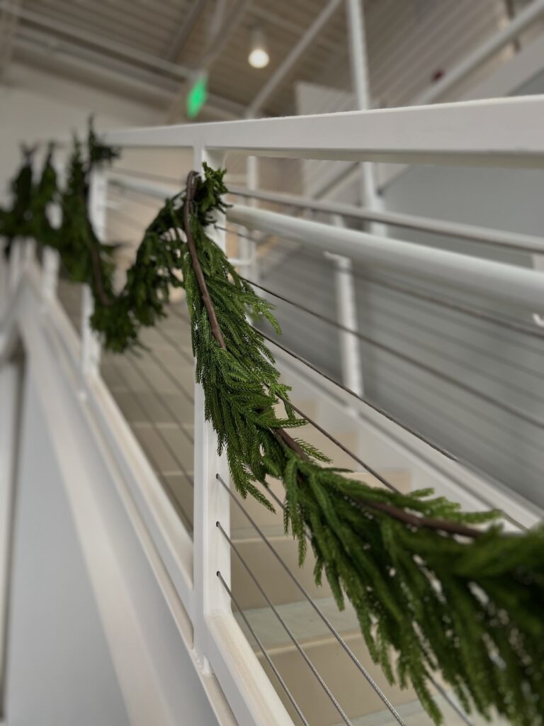 Pine greenery on PINE's staircase