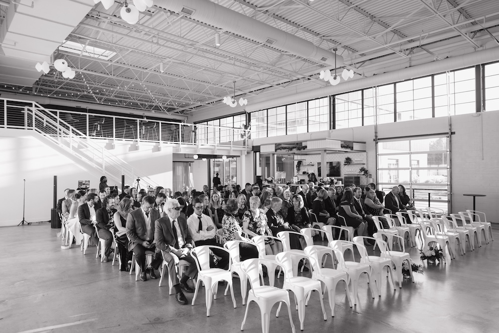 Guests eagerly awaiting a wedding ceremony at PINE