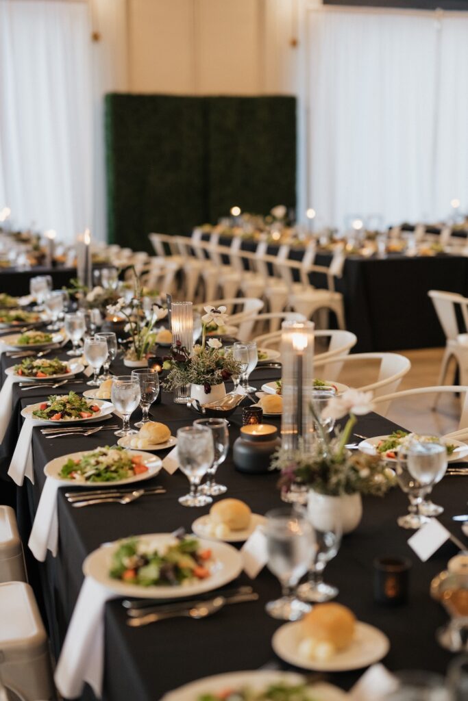 Reception tables at PINE set up for dinner