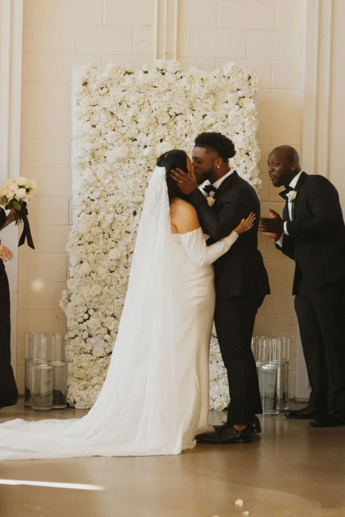 Bride and groom kissing at PINE in Charlotte,NC