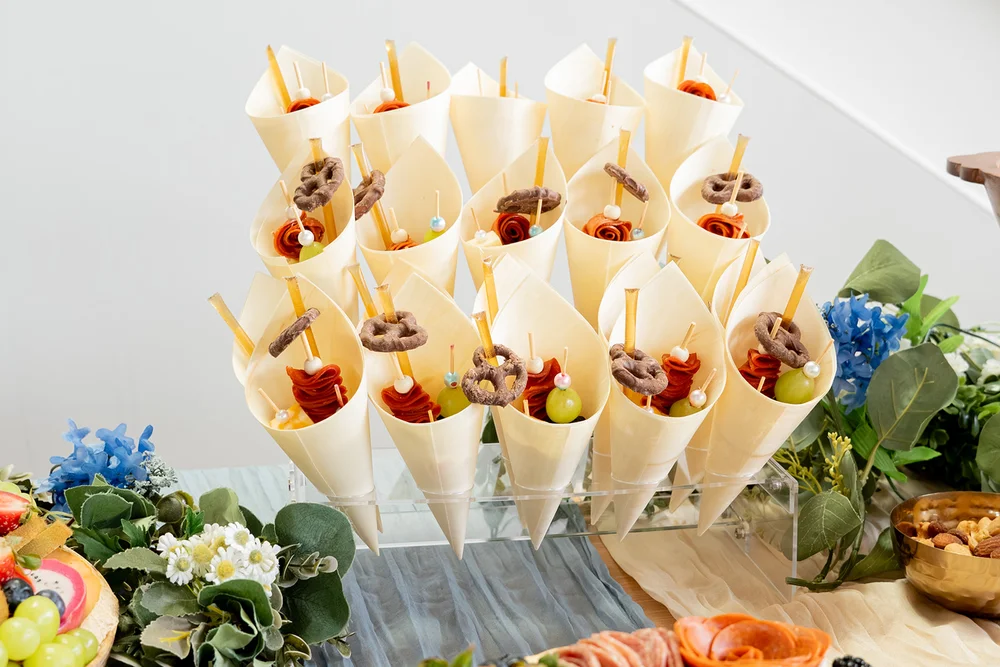 Charcuterie display at PINE Charlotte featuring assorted meats, cheeses, and fruits