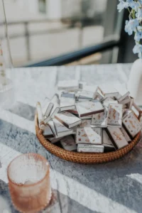 Matchboxes displayed as wedding favors at PINE in Charlotte