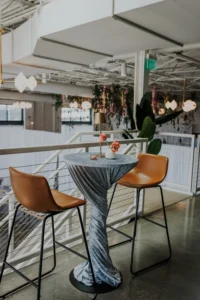 Cocktail tables setup on the mezzanine at PINE in Charlotte