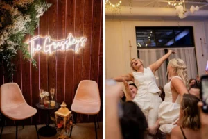 This is a collage of two images, one is a wooden backdrop with a neon sign. In front of the backdrop are two pink velvet chairs and a small side table with cocktails on it. The second photo is of two brides being lifted up by their guests on the dance floor.