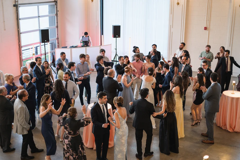 Wedding guests dancing at PINE venue in Charlotte NC